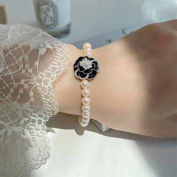 charm bracelets u-magical luxury camellia freshwater imitation pearl bracelet for women vintage enamel black white beaded jewelry, Golden;silver
charm bracelets u-magical luxury camellia freshwater imitation pearl bracelet for women vintage enamel black white beaded jewelry, Golden;silver