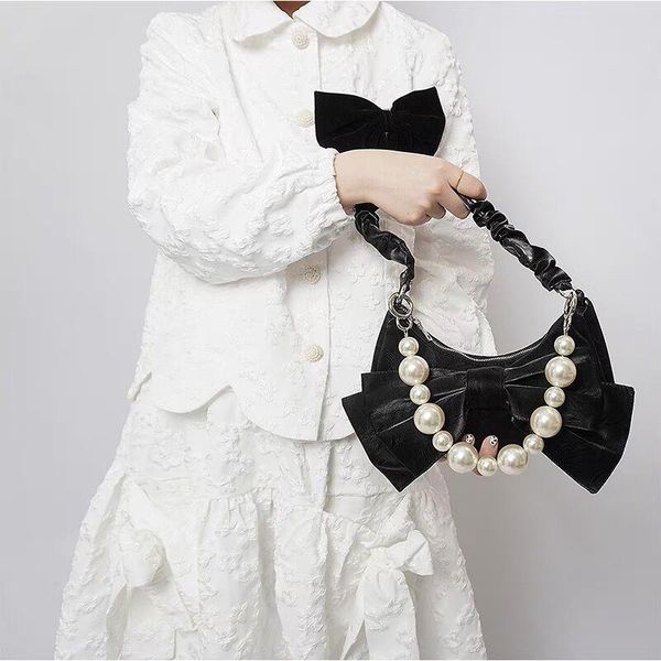 shoulder bags vintage one-shoulder slant pearl chain niche design simple hand-held bow bag for girl
shoulder bags vintage one-shoulder slant pearl chain niche design simple hand-held bow bag for girl