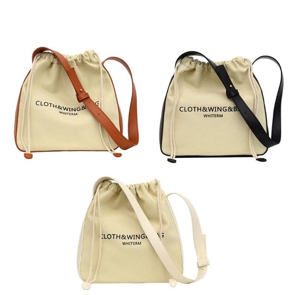 storage bags 2021 women casual canvas shoulder bag with faux leather strap crossbody tote purse letters print drawstring handbag pouch
storage bags 2021 women casual canvas shoulder bag with faux leather strap crossbody tote purse letters print drawstring handbag pouch