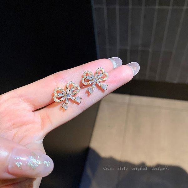 genuine gold electroplating 925 silver needle pearl zircon bow earrings fashion simple earrings mori temperament earrings female
genuine gold electroplating 925 silver needle pearl zircon bow earrings fashion simple earrings mori temperament earrings female