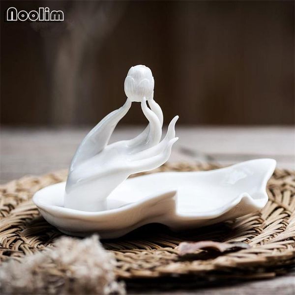 fragrance lamps handmade ceramic incense burner creative buddha hand white lotus porcelain stick holder home decor
fragrance lamps handmade ceramic incense burner creative buddha hand white lotus porcelain stick holder home decor