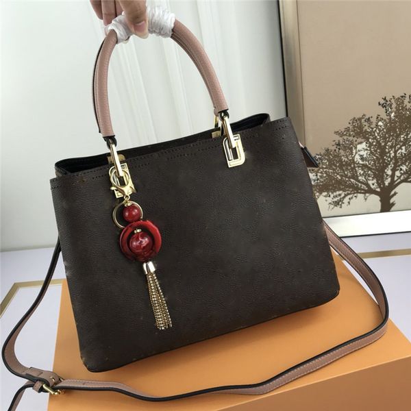 2021 tote simple tassel old flower hard handle handbag large capacity one shoulder messenger bag size:29x22x13 v-081
2021 tote simple tassel old flower hard handle handbag large capacity one shoulder messenger bag size:29x22x13 v-081