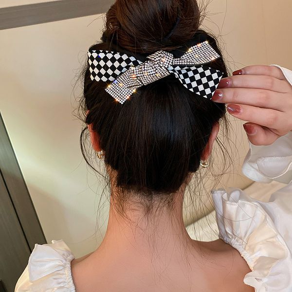 korean temperament small fragrance rhinestones black and white plaid bow large intestine ring fashion female ponytail headdress, Slivery;white
korean temperament small fragrance rhinestones black and white plaid bow large intestine ring fashion female ponytail headdress, Slivery;white