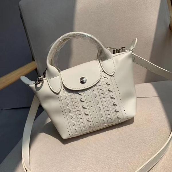 totes 2021 lace lambskin mini jiaozi bag female shoulder messenger 
totes 2021 lace lambskin mini jiaozi bag female shoulder messenger