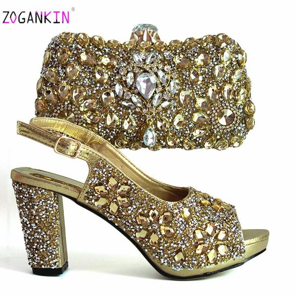 elegant ladies matching shoes and bag set in golden color decorate with rhinestone to match for party dress, Black
elegant ladies matching shoes and bag set in golden color decorate with rhinestone to match for party dress, Black