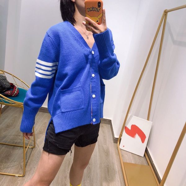 8552 blue whale cardigan korean animal pattern short front and back v-neck long sleeve loose cuff striped women's dress, White
8552 blue whale cardigan korean animal pattern short front and back v-neck long sleeve loose cuff striped women's dress, White