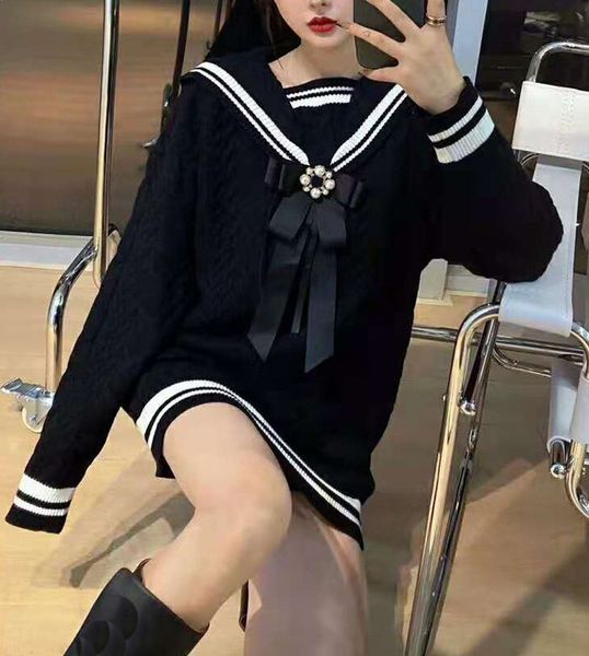 simple bow decoration medium long knitted skirt women's aging college style navy neck loose and thin sweater fashion, White
simple bow decoration medium long knitted skirt women's aging college style navy neck loose and thin sweater fashion, White