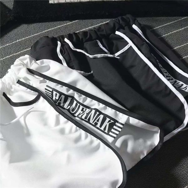 men's shorts boys' sports shorts korean loose pants trend students' english print beach underpants, White;black
men's shorts boys' sports shorts korean loose pants trend students' english print beach underpants, White;black