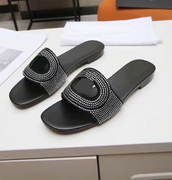 direct selling men's and women's designer slippers fashion letters drill leather flat sandals indoor street show delivery box 35-4, Black
direct selling men's and women's designer slippers fashion letters drill leather flat sandals indoor street show delivery box 35-4, Black