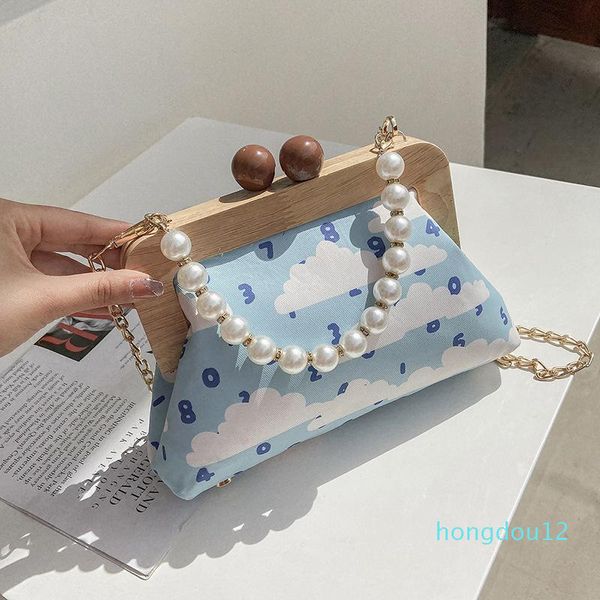 evening bags pearl handle digital printing female dinner bag retro clip canvas ladies one-shoulder messenger
evening bags pearl handle digital printing female dinner bag retro clip canvas ladies one-shoulder messenger
