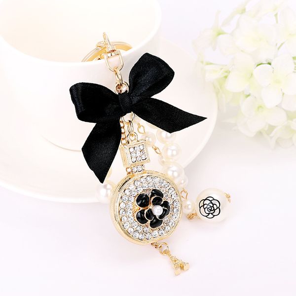 new creative handmade pendant perfume bottle butterfly knot shape alloy key ring pearl ornament, Slivery;golden
new creative handmade pendant perfume bottle butterfly knot shape alloy key ring pearl ornament, Slivery;golden