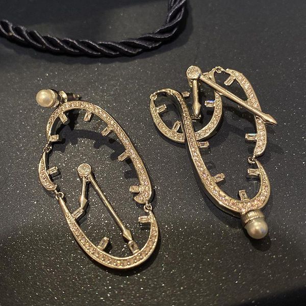 hoop & huggie bilincolor fashion unique deformation clock earring for women, Golden;silver
hoop & huggie bilincolor fashion unique deformation clock earring for women, Golden;silver