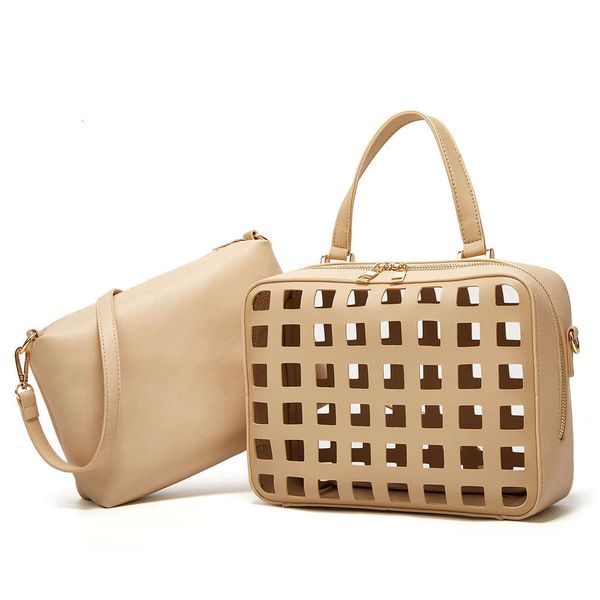 fashion messenger women's bag 2-piece set hollow mother and son single shoulder handbag
fashion messenger women's bag 2-piece set hollow mother and son single shoulder handbag