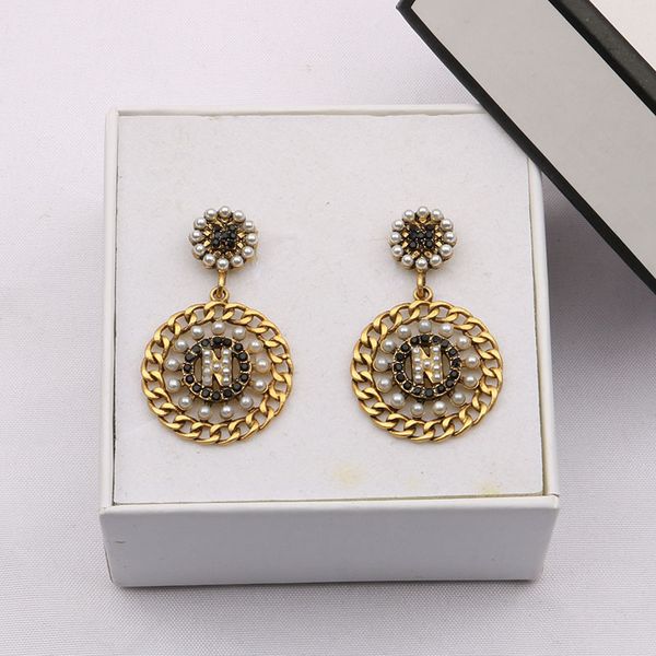 new asian gold fashion earrings make old hollowed out round pearl band diamond star earrings, Silver
new asian gold fashion earrings make old hollowed out round pearl band diamond star earrings, Silver