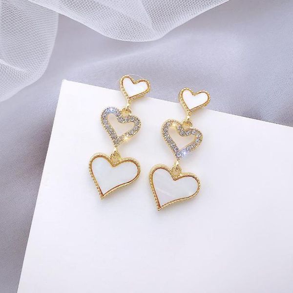 sweet girl earrings 2021 fashion three size love shell peach heart hollow crystal heart-shaped temperament net red stud, Golden;silver
sweet girl earrings 2021 fashion three size love shell peach heart hollow crystal heart-shaped temperament net red stud, Golden;silver