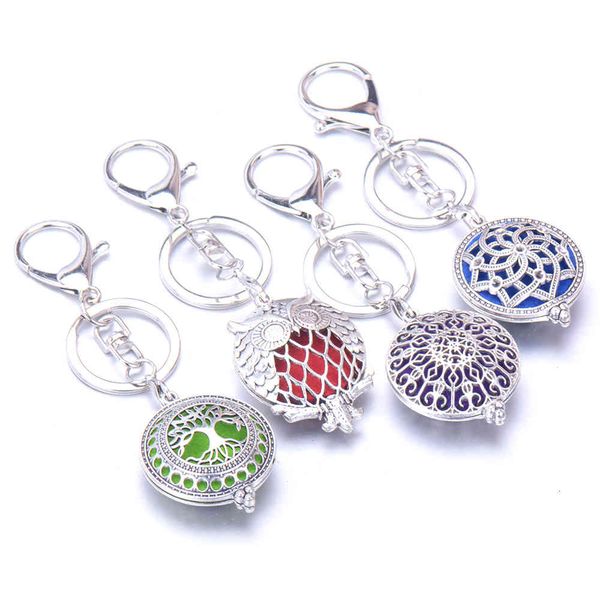 aroma diffuser keychain open antique vintage lockets pendant perfume essential oil aromatherapy locket keychain with pads, Silver
aroma diffuser keychain open antique vintage lockets pendant perfume essential oil aromatherapy locket keychain with pads, Silver