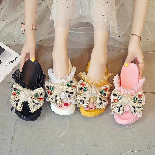 slippers increased inner thick sole sweet bowknot ladies sports summer fashion rhinestone sandals outer wear non-slip., Black
slippers increased inner thick sole sweet bowknot ladies sports summer fashion rhinestone sandals outer wear non-slip., Black