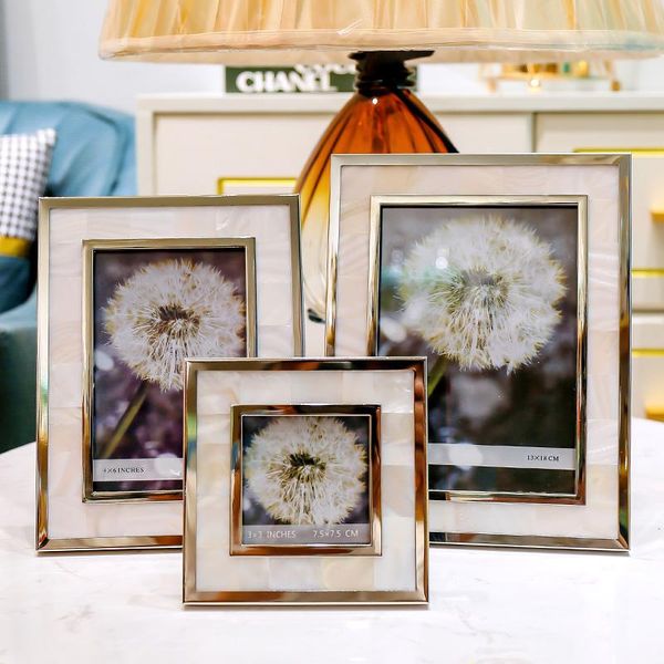 frames nordic light luxury and simplicity style wedding po frame holder shell creative assembly table decoration
frames nordic light luxury and simplicity style wedding po frame holder shell creative assembly table decoration