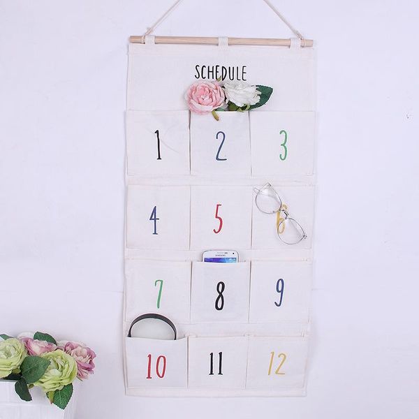 storage boxes & bins 12 pockets wall hanging linen fabric organizer toys decor pouch cloth sundries container save space key home supplies
storage boxes & bins 12 pockets wall hanging linen fabric organizer toys decor pouch cloth sundries container save space key home supplies