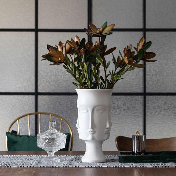 nordic white ceramic face vase multi-faceted flower implement hand - shaped fist decorative furnishing home decoration vases
nordic white ceramic face vase multi-faceted flower implement hand - shaped fist decorative furnishing home decoration vases