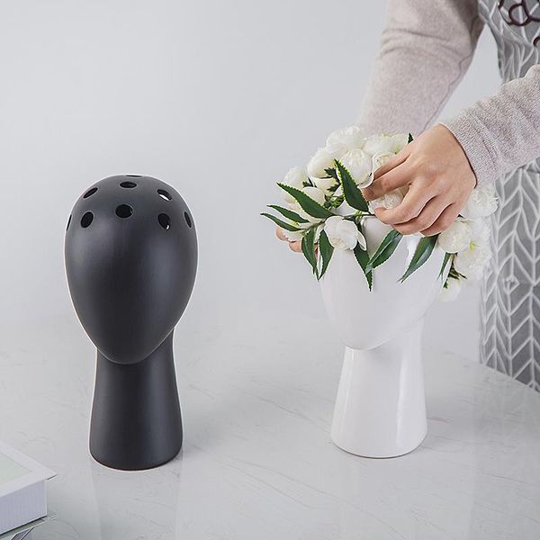 nordic style creative human head model ceramic vase round hole flower arrangement home living room decoration decorative objects & figurines
nordic style creative human head model ceramic vase round hole flower arrangement home living room decoration decorative objects & figurines