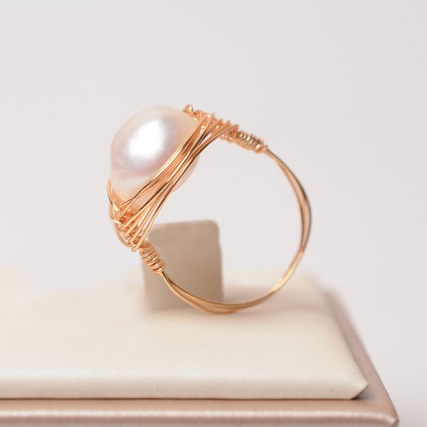 hand wound natural freshwater pearl ring fashion hand decorated baroque pearl ring, Silver
hand wound natural freshwater pearl ring fashion hand decorated baroque pearl ring, Silver