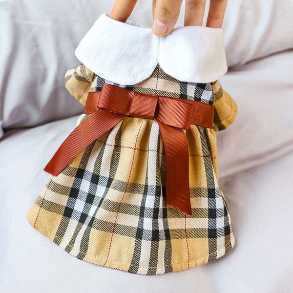 the dog clothes pet cat dog spring and summer teddy bear clothing brown butterfly
the dog clothes pet cat dog spring and summer teddy bear clothing brown butterfly