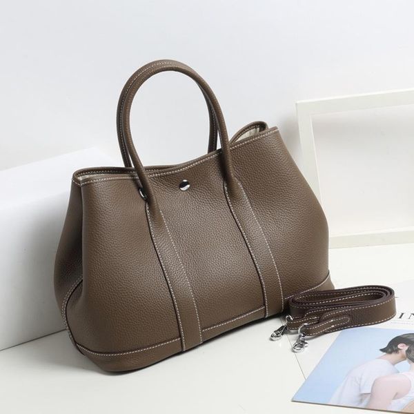 evening bags gaohe lychee pattern cowhide garden bag large capacity tote leather women's handbag wide shoulder strap one ba
evening bags gaohe lychee pattern cowhide garden bag large capacity tote leather women's handbag wide shoulder strap one ba