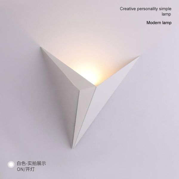 wall lamp creative iron-shaped triangular simple bedroom study el room bedside led headlights.
wall lamp creative iron-shaped triangular simple bedroom study el room bedside led headlights.