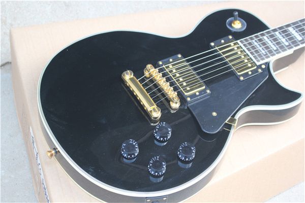 black electric guitar, ebony fingerboard, concave waist, gold hardware, solid mahogany body electric guitar guitars guitarra
black electric guitar, ebony fingerboard, concave waist, gold hardware, solid mahogany body electric guitar guitars guitarra