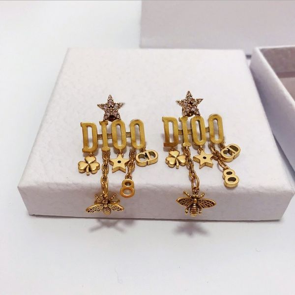 design jewelry / letter star tassel net red temperament women's bronze earrings, Golden
design jewelry / letter star tassel net red temperament women's bronze earrings, Golden