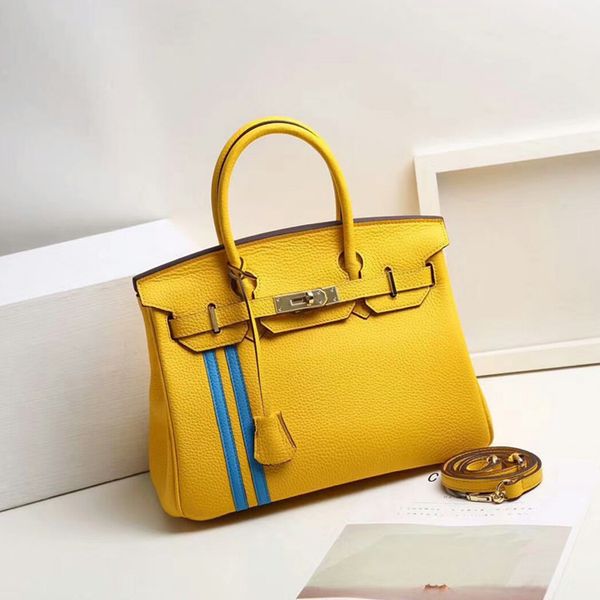 design purse new head layer leather handbag one shoulder slanting bag vertical grain edge fashion
design purse new head layer leather handbag one shoulder slanting bag vertical grain edge fashion