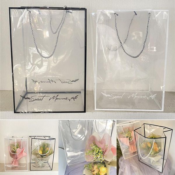 transparent artificial pvc packaging bag flower box gift with handle rose wrapping wrap
transparent artificial pvc packaging bag flower box gift with handle rose wrapping wrap