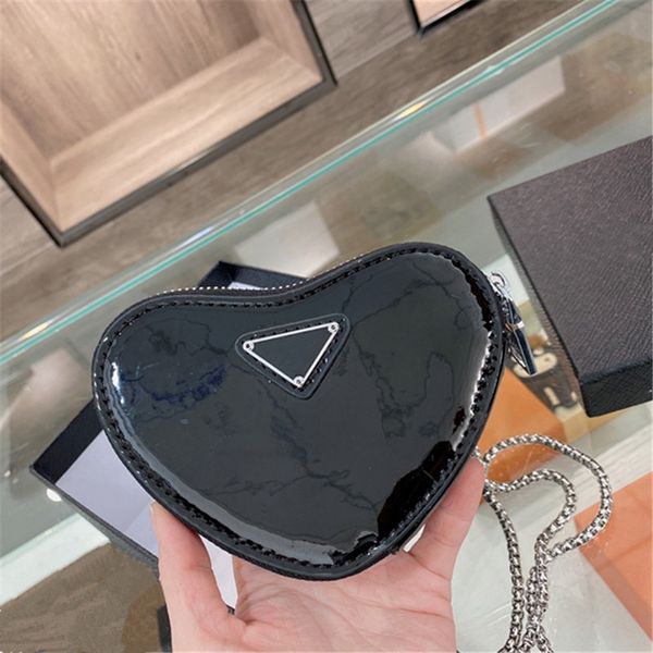 designers mini heart crossbody chain bags luxury women hearts coin purses fashion girls cute wallets triangle shoulder bag patent leather
designers mini heart crossbody chain bags luxury women hearts coin purses fashion girls cute wallets triangle shoulder bag patent leather