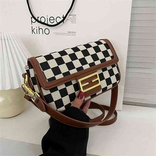 60% clearance sale black and white check color contrast small square bag fashion net red single shoulder bag women's belt
60% clearance sale black and white check color contrast small square bag fashion net red single shoulder bag women's belt