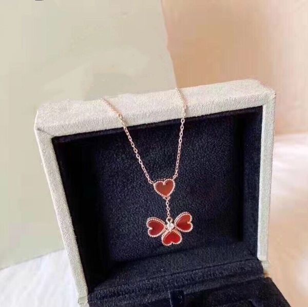 fanjia four flower 18k gold plated pure silver love heart pendant tassel necklace inlaid with natural red agate
fanjia four flower 18k gold plated pure silver love heart pendant tassel necklace inlaid with natural red agate