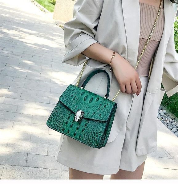 drawstring crocodile pattern fashionable female bag trend line embossed ladies shoulder messenger handbag
drawstring crocodile pattern fashionable female bag trend line embossed ladies shoulder messenger handbag