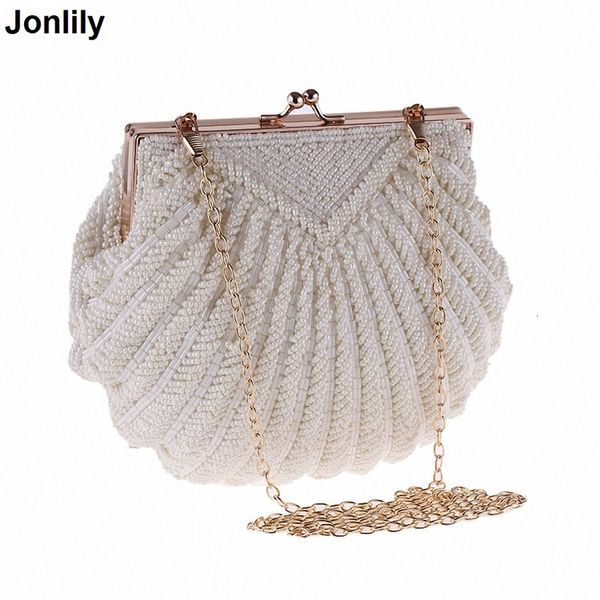women evening clutch wedding bridal handbag pearl beaded fashion shell chain party bags li-383 
women evening clutch wedding bridal handbag pearl beaded fashion shell chain party bags li-383