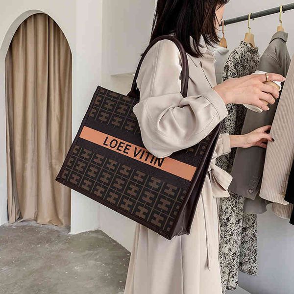 2022 factory wholesale new model women's bag large capacity color portable bag
2022 factory wholesale new model women's bag large capacity color portable bag