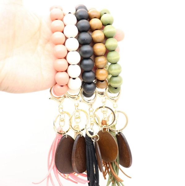party favor wooden bead wrist stretch keychain bracelet with tassel wristband bangle keychain
party favor wooden bead wrist stretch keychain bracelet with tassel wristband bangle keychain