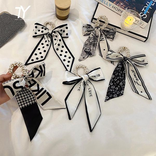 hair accessories 2021 elegant letter pearl strip ribbon bow for woman sweet fashion korean jewelry creative headband
hair accessories 2021 elegant letter pearl strip ribbon bow for woman sweet fashion korean jewelry creative headband