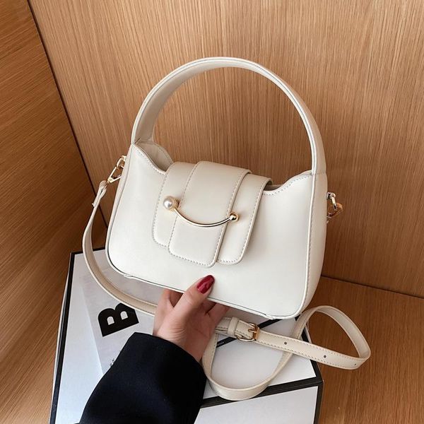 pearl buckle portable handbag 2021 simple casual korean fashion ladies shoulder bag net red crossbody saddle evening bags
pearl buckle portable handbag 2021 simple casual korean fashion ladies shoulder bag net red crossbody saddle evening bags