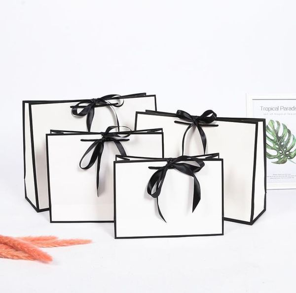 gift wrap creative design large black border white kraft paper bag with handle wedding party favor bowknot sn1879
gift wrap creative design large black border white kraft paper bag with handle wedding party favor bowknot sn1879