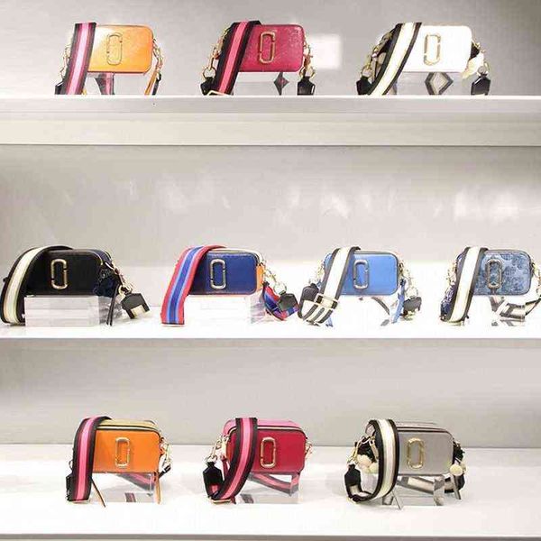 evening bags 2022 spring korean fashion trend wide shoulder strap camera female msenger small square bag versatile
evening bags 2022 spring korean fashion trend wide shoulder strap camera female msenger small square bag versatile