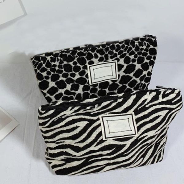cosmetic bags & cases makeup bag beauty case washing clutch nice organizer zipper jacquard black and white cow
cosmetic bags & cases makeup bag beauty case washing clutch nice organizer zipper jacquard black and white cow