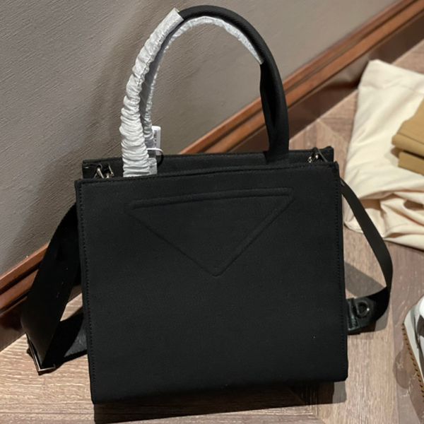 fashion women shoulder bags unique triangle logo canvas handbags designer lady tote handbag purse messenger crossbody bag
fashion women shoulder bags unique triangle logo canvas handbags designer lady tote handbag purse messenger crossbody bag
