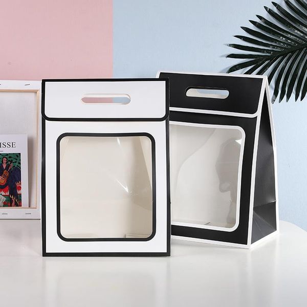 gift wrap transparent paper bag with pvc clear window black white flower candy boxes packaging bags business wrapping tote
gift wrap transparent paper bag with pvc clear window black white flower candy boxes packaging bags business wrapping tote