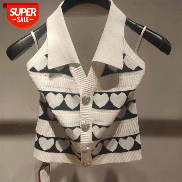 hong kong-style retro fashionable bright diamond heart-shaped buckle halterneck lapel sweater feminine halter western style sleeveless #fm2y, White
hong kong-style retro fashionable bright diamond heart-shaped buckle halterneck lapel sweater feminine halter western style sleeveless #fm2y, White