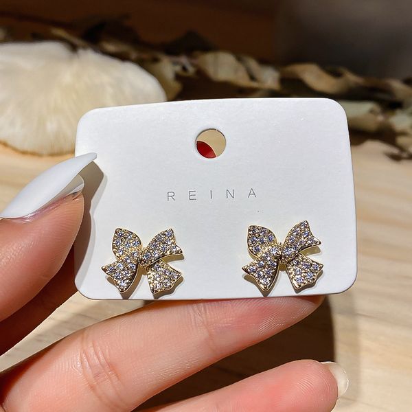 real gold electroplating fashion simple full diamond bow 925 silver needle small earrings temperament earrings, Golden
real gold electroplating fashion simple full diamond bow 925 silver needle small earrings temperament earrings, Golden