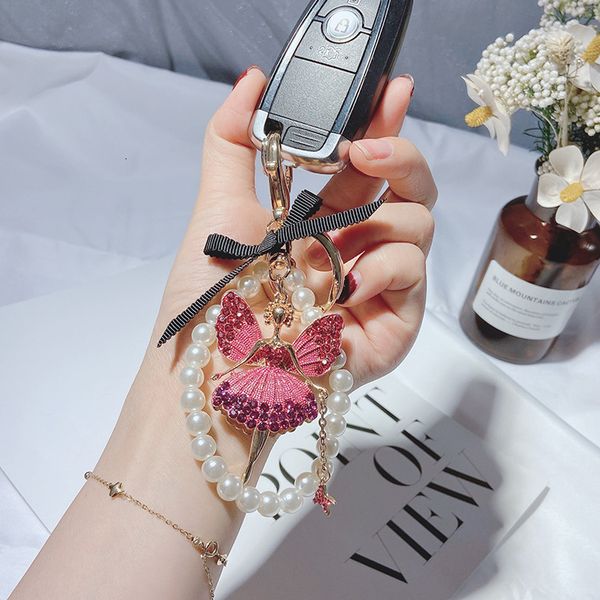 creative angel keychain schoolgirl bag pendant pearl chain ballet girl diamond car, Silver
creative angel keychain schoolgirl bag pendant pearl chain ballet girl diamond car, Silver